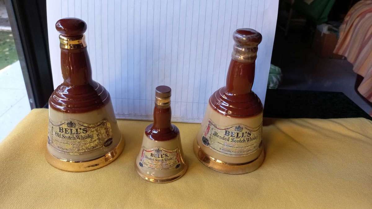 Vintage collectable lot of "Bells Scotch Whisky " bell shaped decanters made by Wade