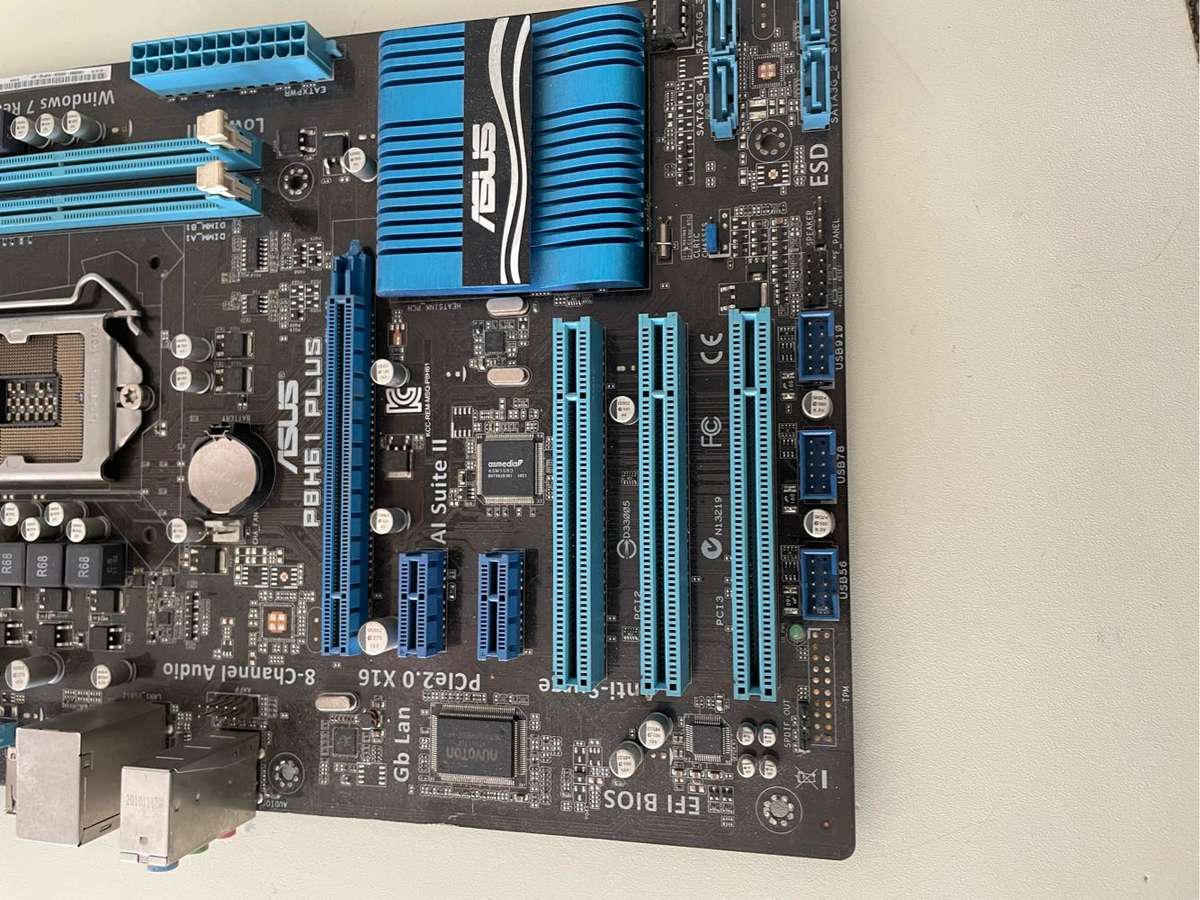 Asus P8H61 Plus Motherboard**For Parts Or repairs**