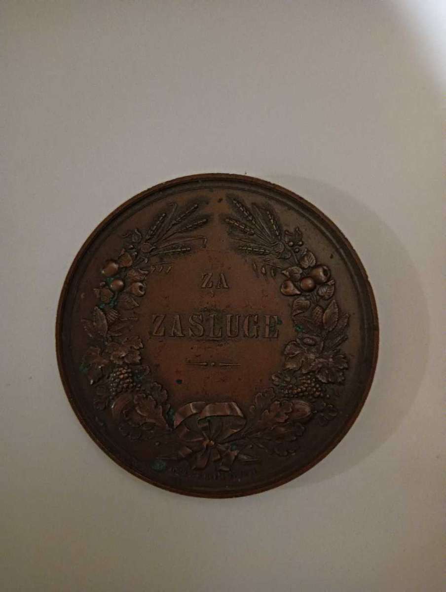 Antique medal dated 1889