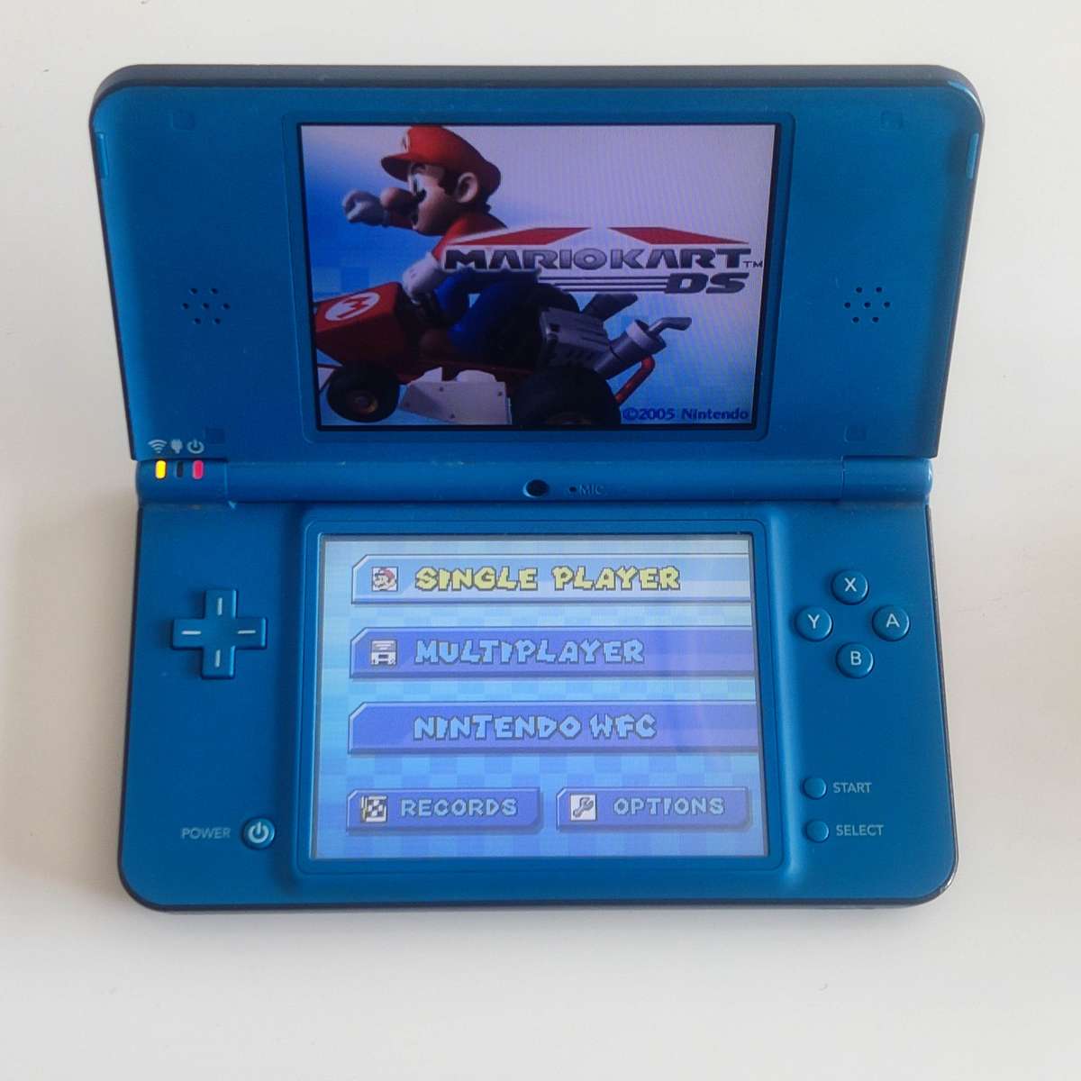 Nintendo Dsi XL console with charger