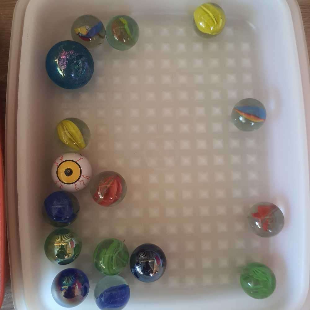 Marbes x 200 small ones and 16 goones big ones