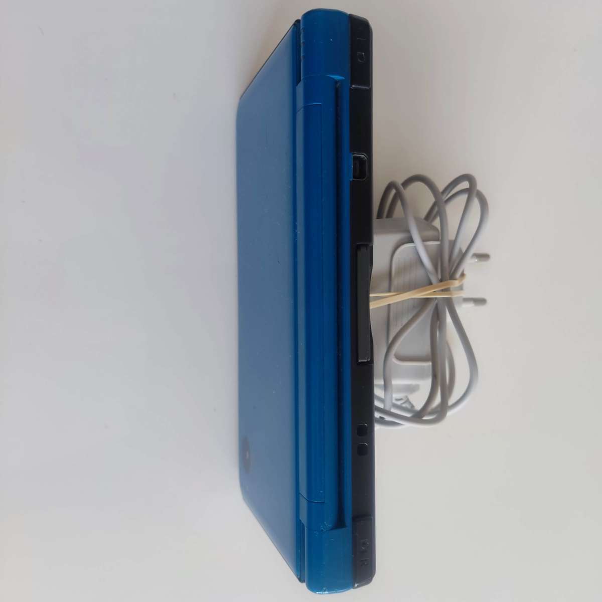 Nintendo Dsi XL console with charger