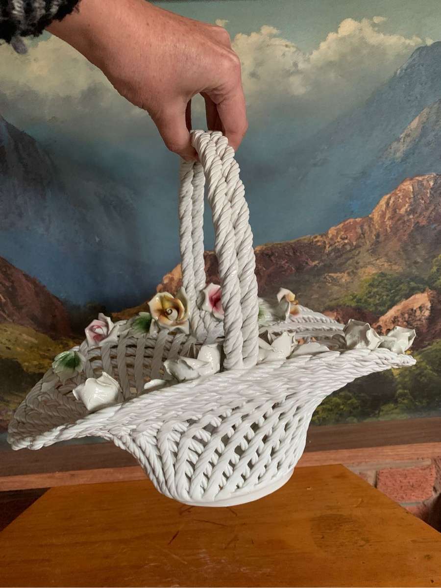 Huge woven pottery basket decorated with roses