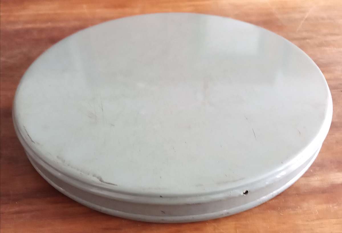 9.5mm Projector Film Reel in Vintage Tin.