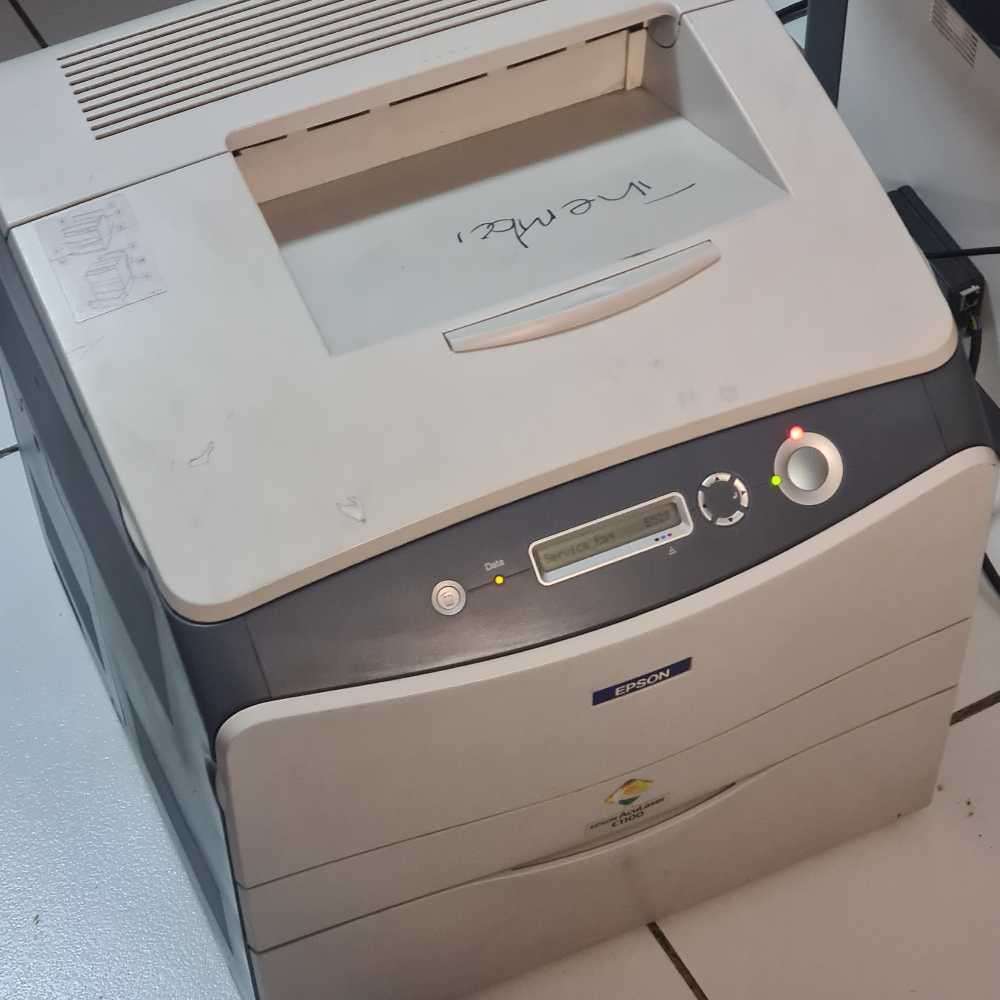 Epson Aculaser c1100 Lazer printer. (turns on, needs attention)