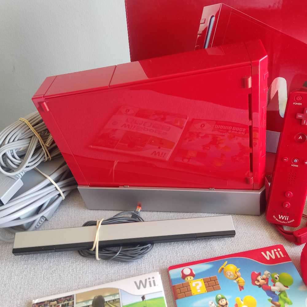 Nintendo Wii console with New Super Mario Bros +Wii Sports