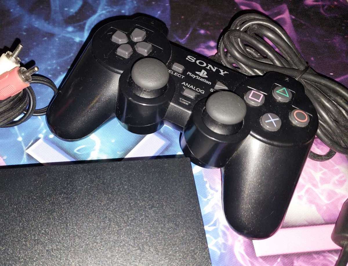 Playstation 2 + x6 Games