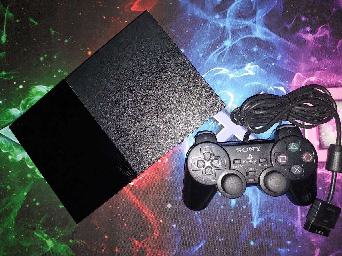 Playstation 2 + x6 Games