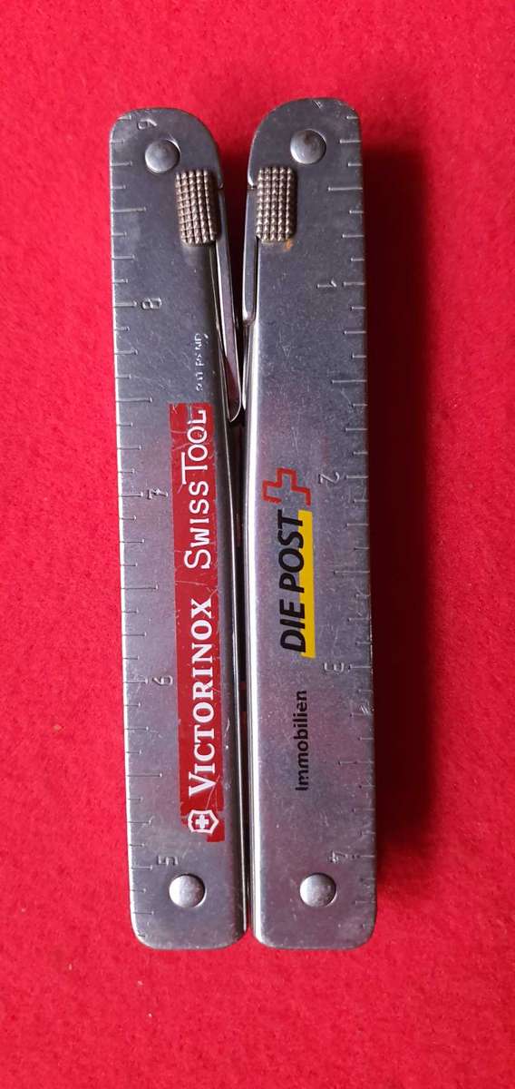 Victorinox SwissTool Multi-Tool  Stainless Steel  Branded  With Original Pouch