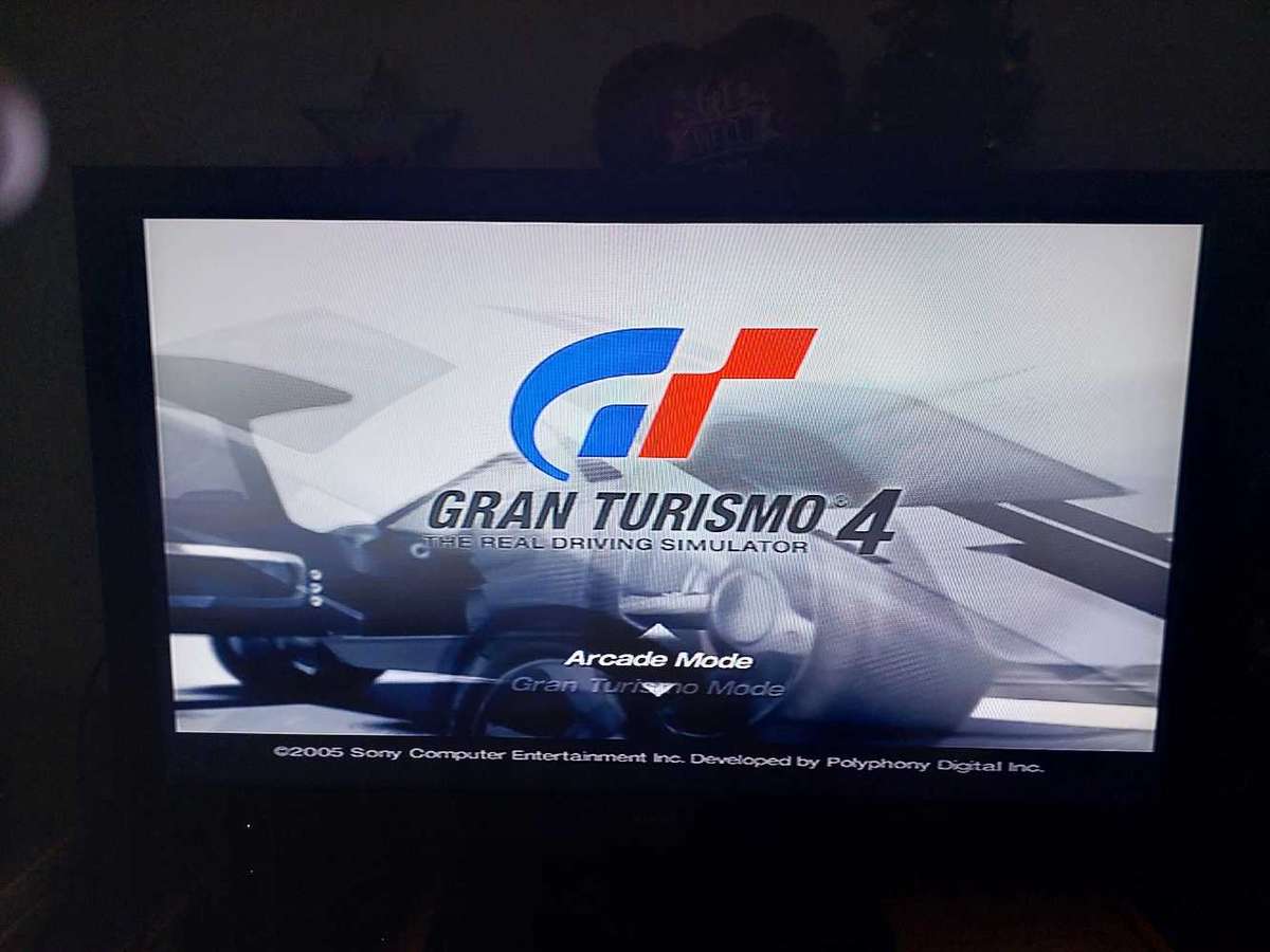 Playstation 2 + x6 Games