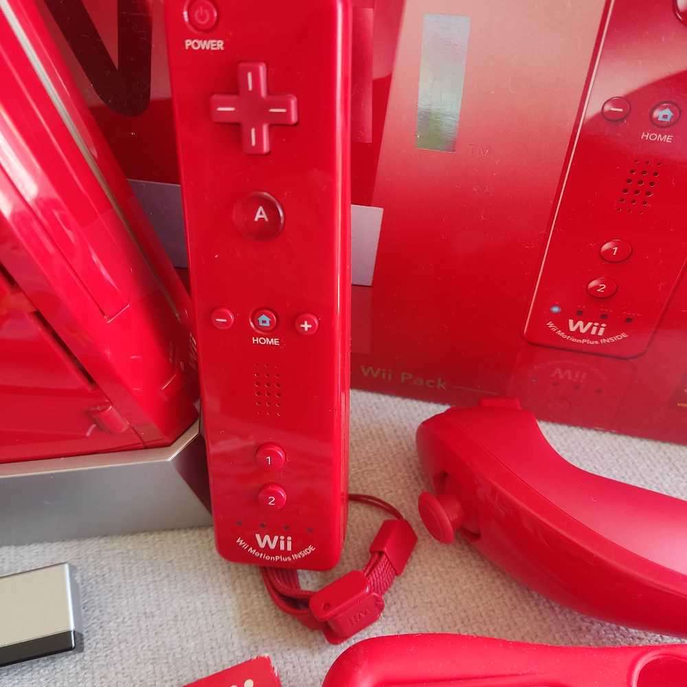 Nintendo Wii console with New Super Mario Bros +Wii Sports