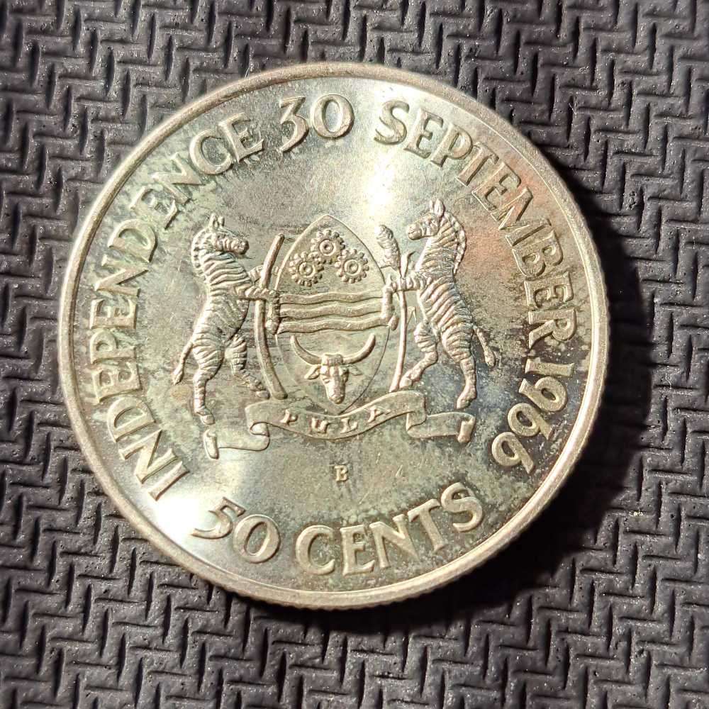 4 x silver coins. Botswana 50 cents, Independence 1966