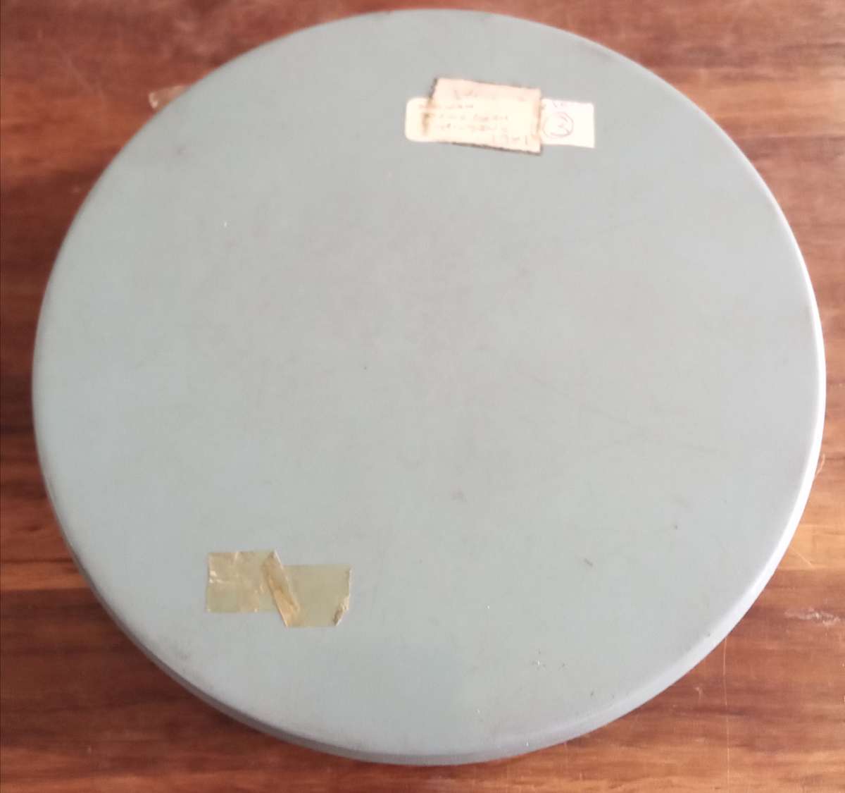 9.5mm Projector Film Reel in Vintage Tin.