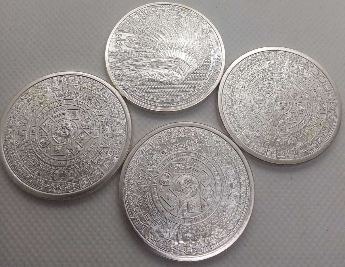 4x1oz Silver Coins as per picture