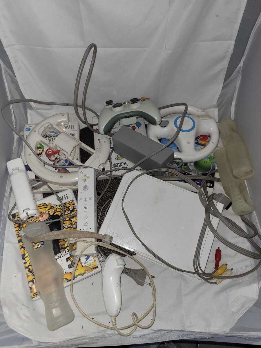Nintendo wii with various accessories and games