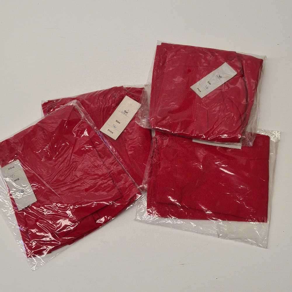 Mid-length girls shirts. School shirts stock