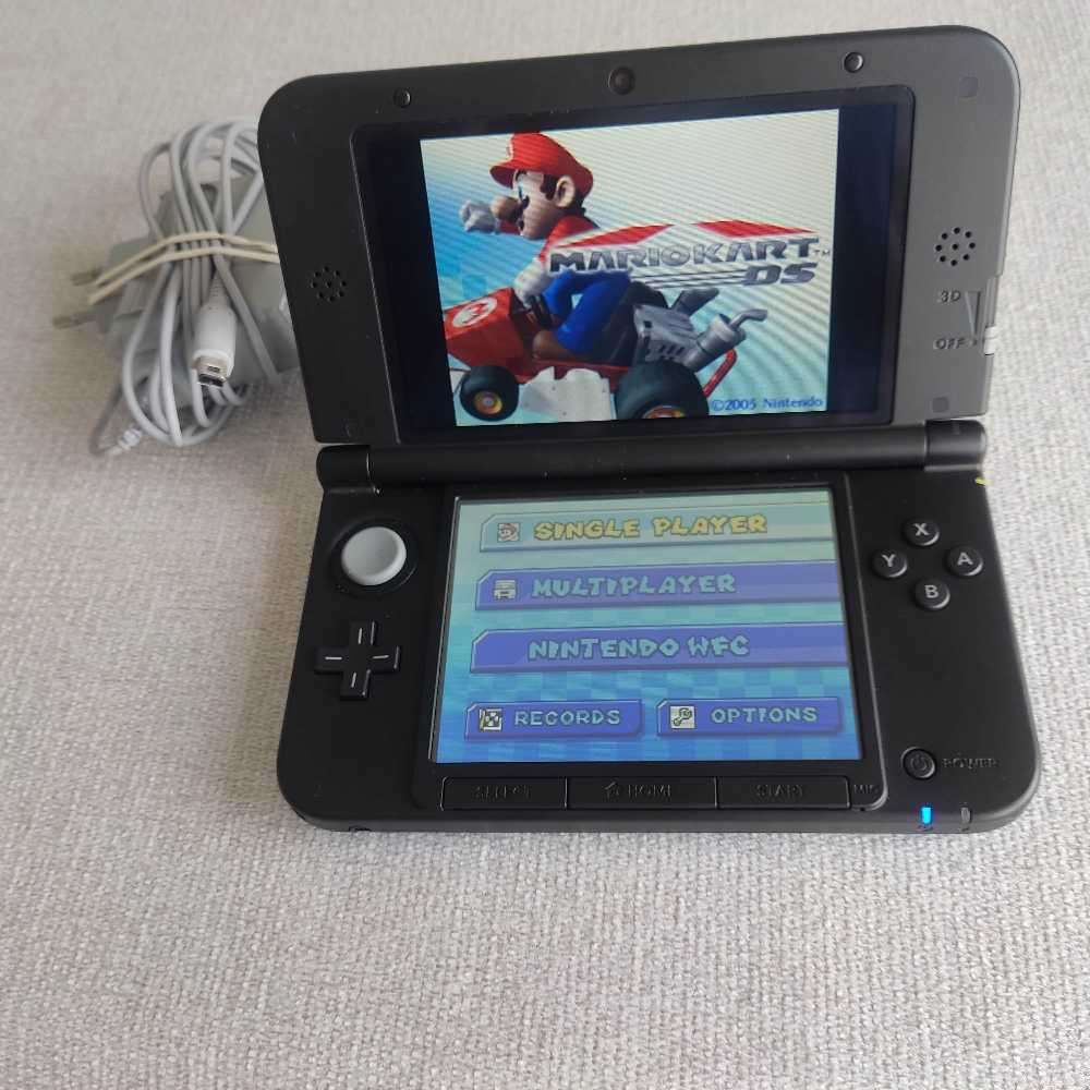 Nintendo 3ds XL console with original charger, stylus and memory card