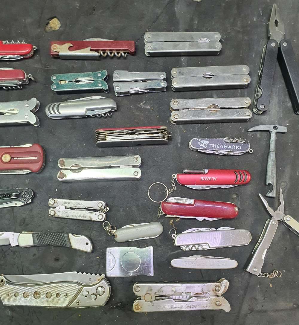 Assorted multitools,pockets knifes