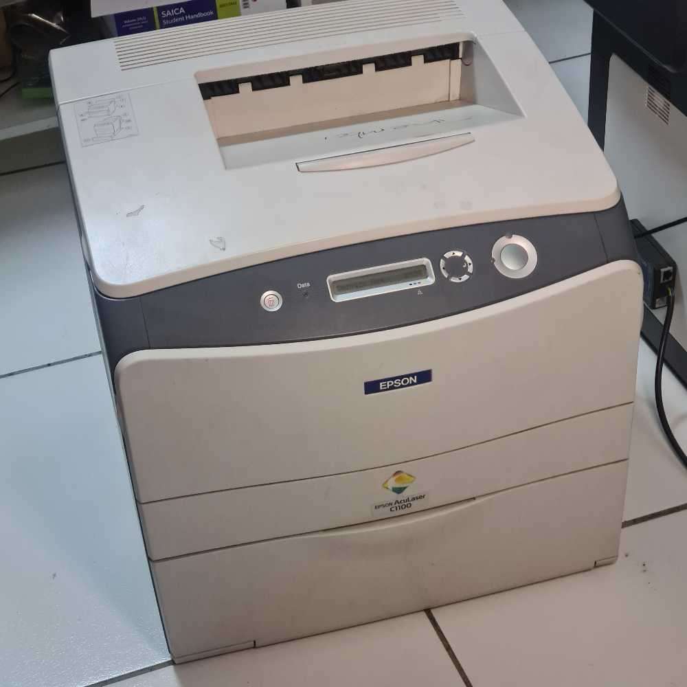 Epson Aculaser c1100 Lazer printer. (turns on, needs attention)