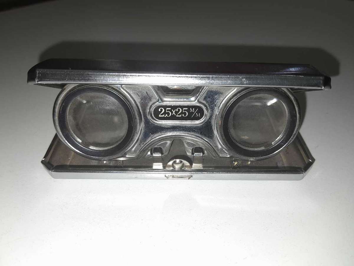Vintage fold up binoculars