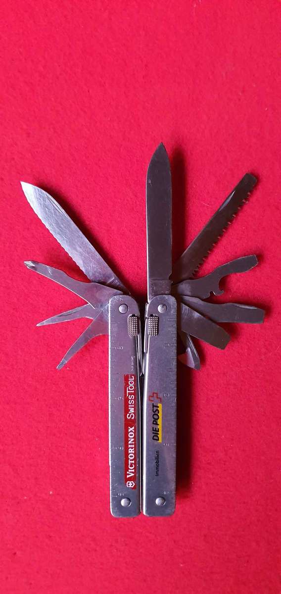 Victorinox SwissTool Multi-Tool  Stainless Steel  Branded  With Original Pouch