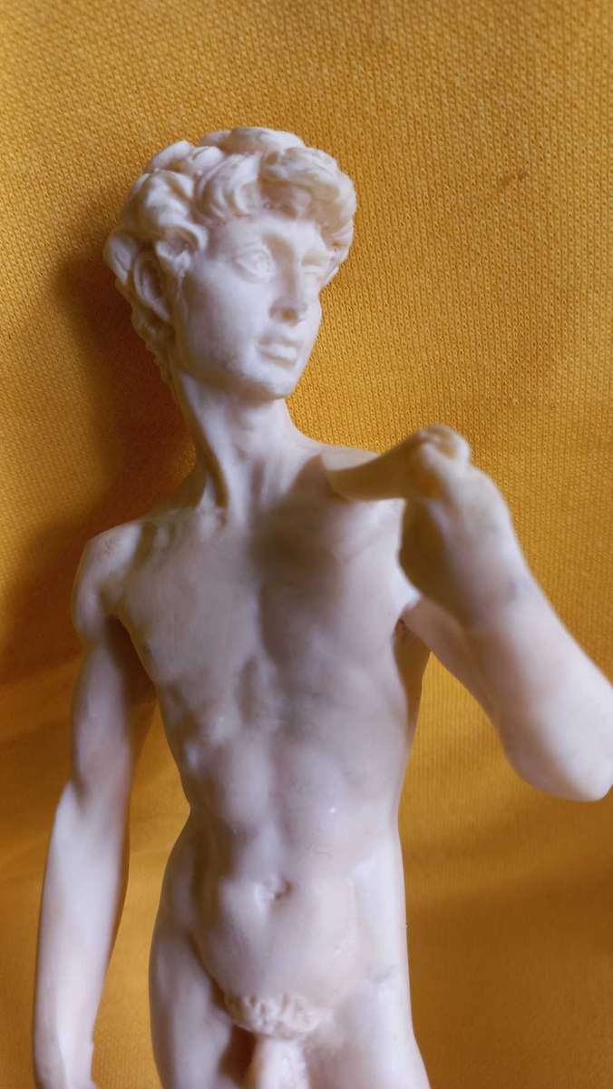 Vintage nude statues of Davide and Aphrodite Venus