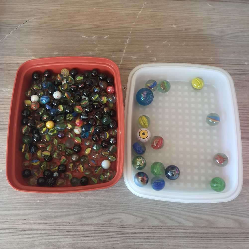Marbes x 200 small ones and 16 goones big ones