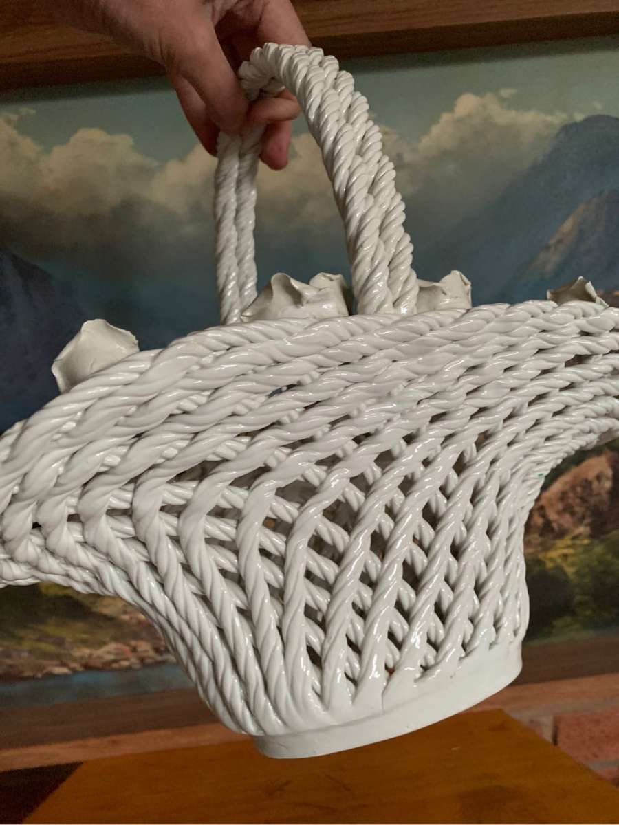 Huge woven pottery basket decorated with roses