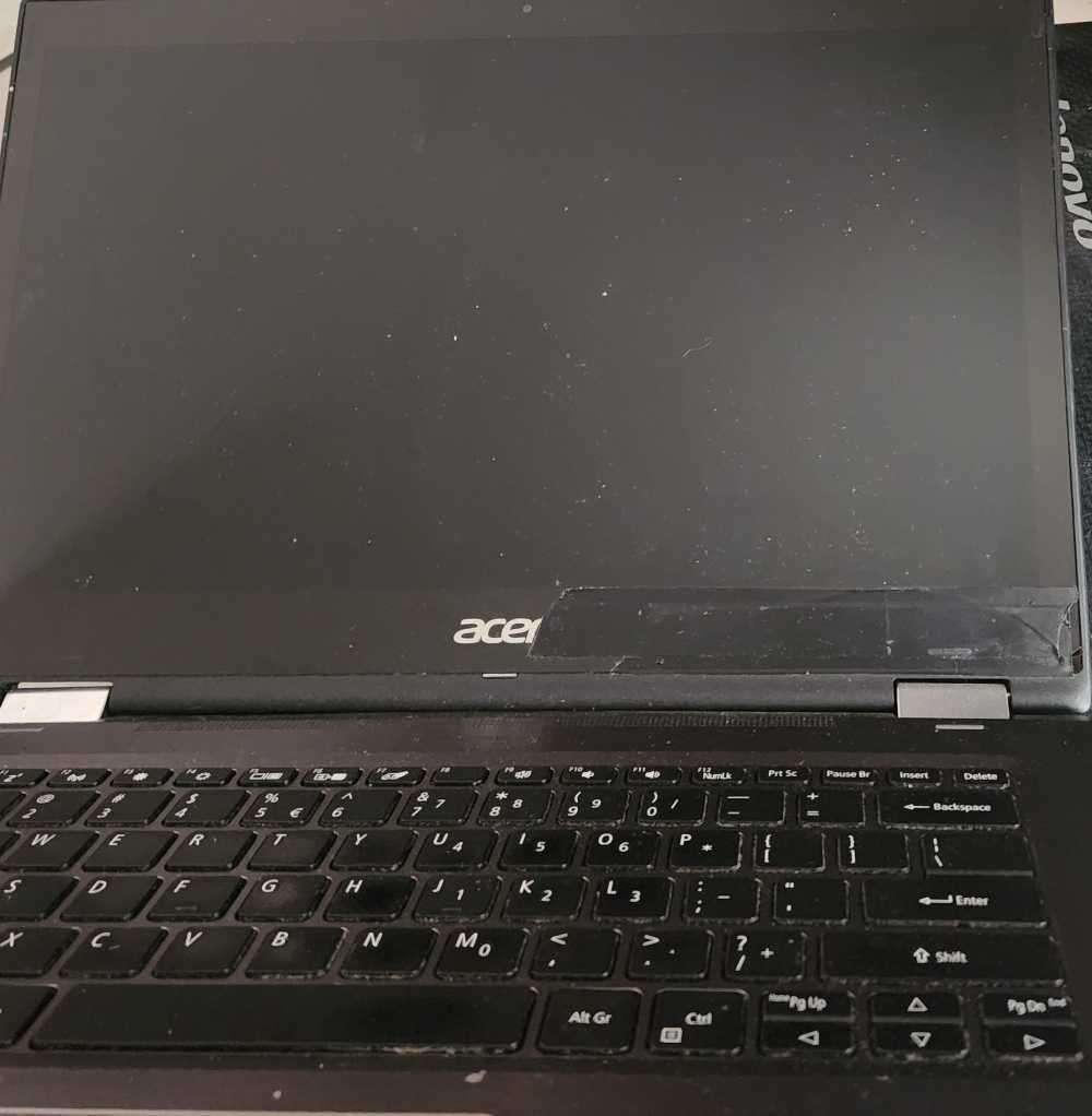Two laptops for spares or to fix and a free cd writer also not working
