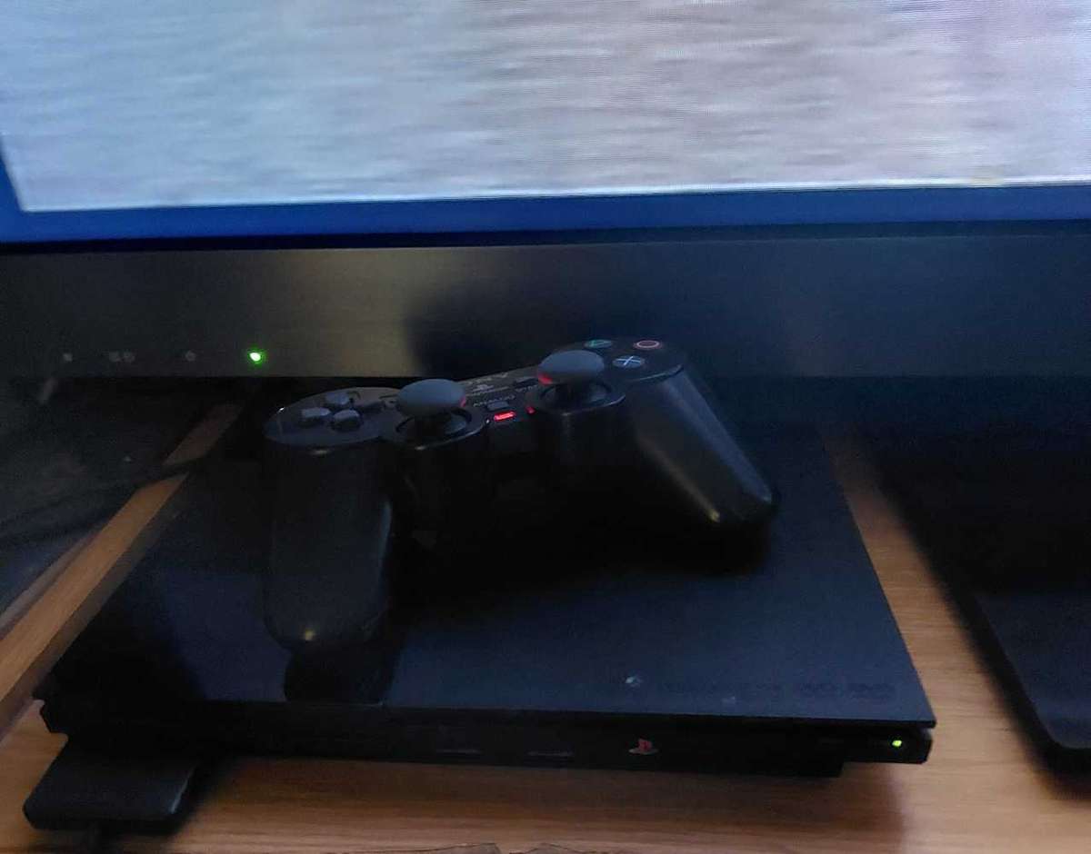 Playstation 2 + x6 Games