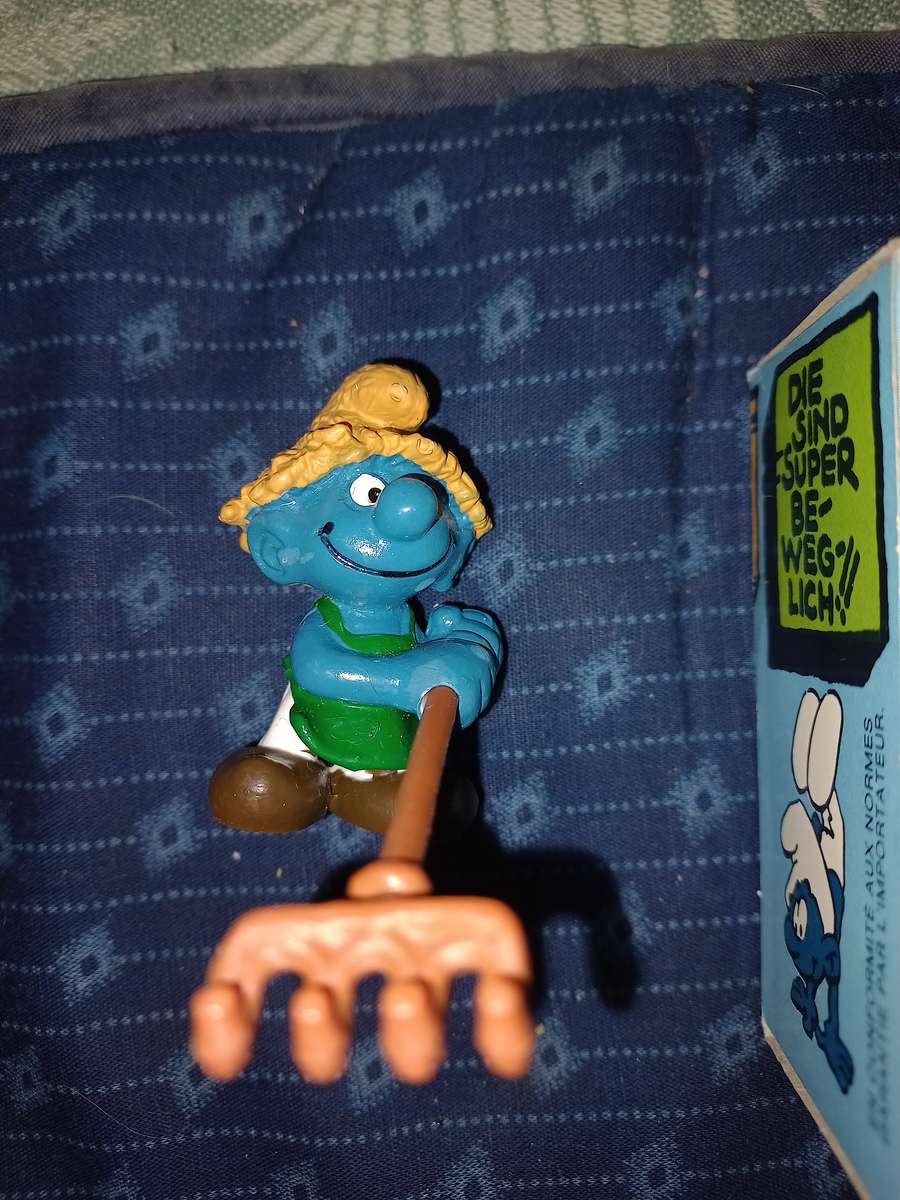 Vintage Smurf with wheelbarrow plus gardener with rake.