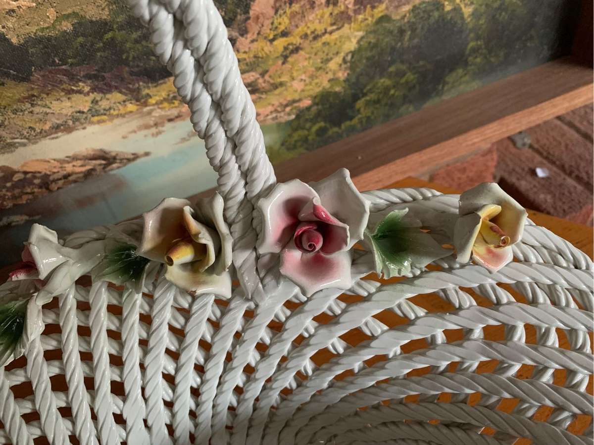 Huge woven pottery basket decorated with roses