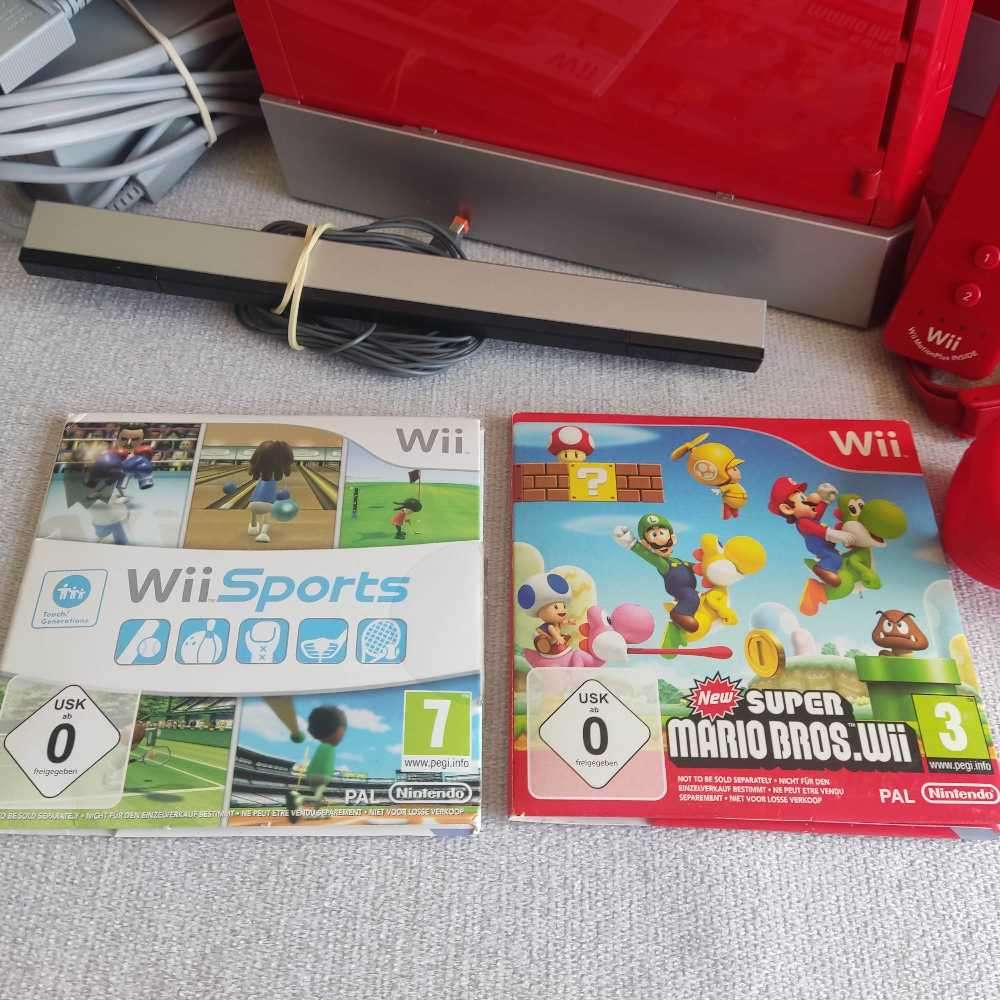 Nintendo Wii console with New Super Mario Bros +Wii Sports