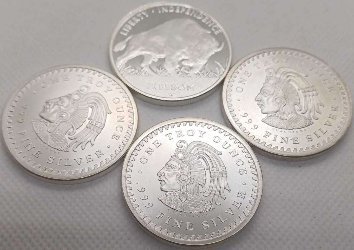 4x1oz Silver Coins as per picture