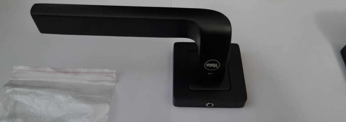 Yale Siena door handles with oval escutcheon done in classy black