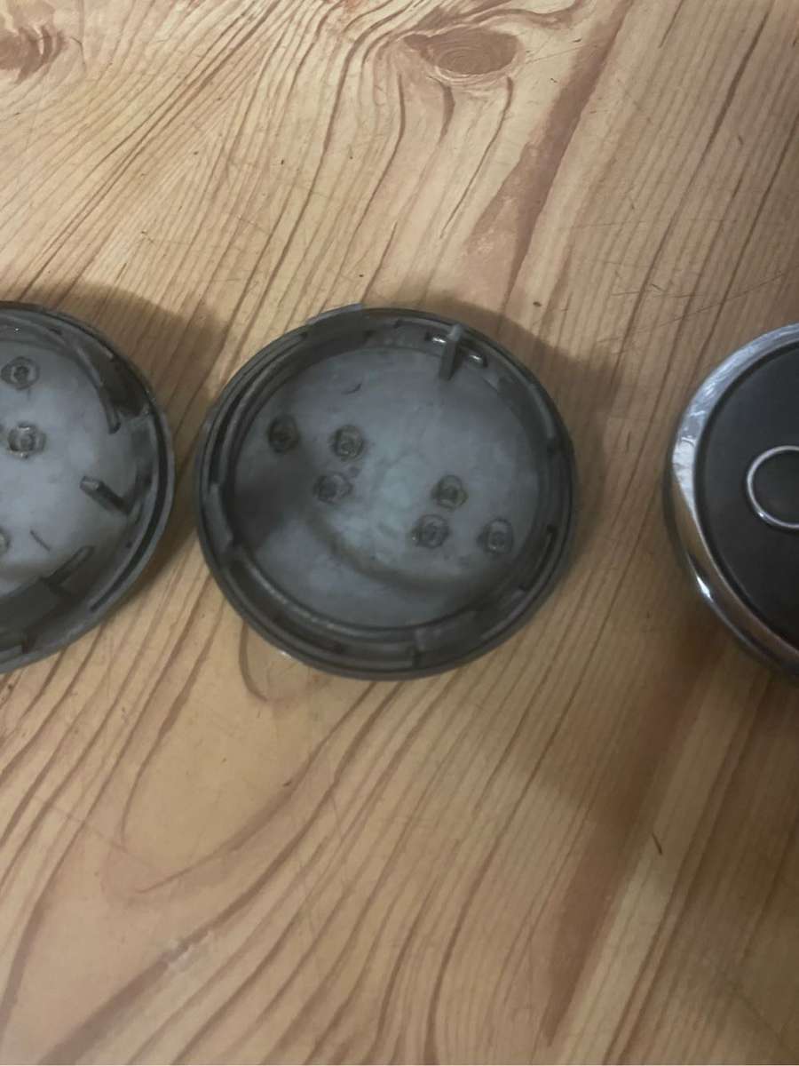 Audi 63mm Grey Mag Center Caps set of 4** Good Condition**
