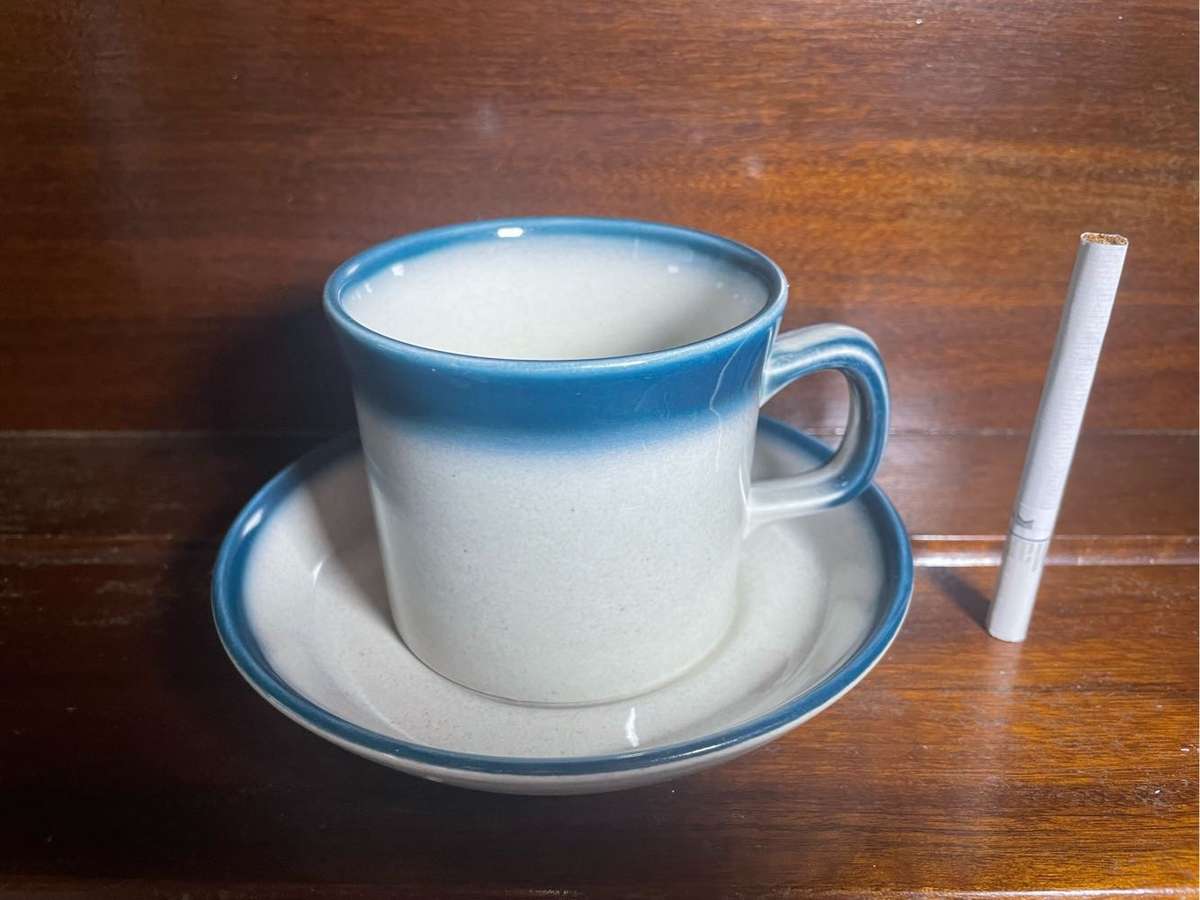 A set of four cups with saucers  - Wedgwood pacific blue pattern