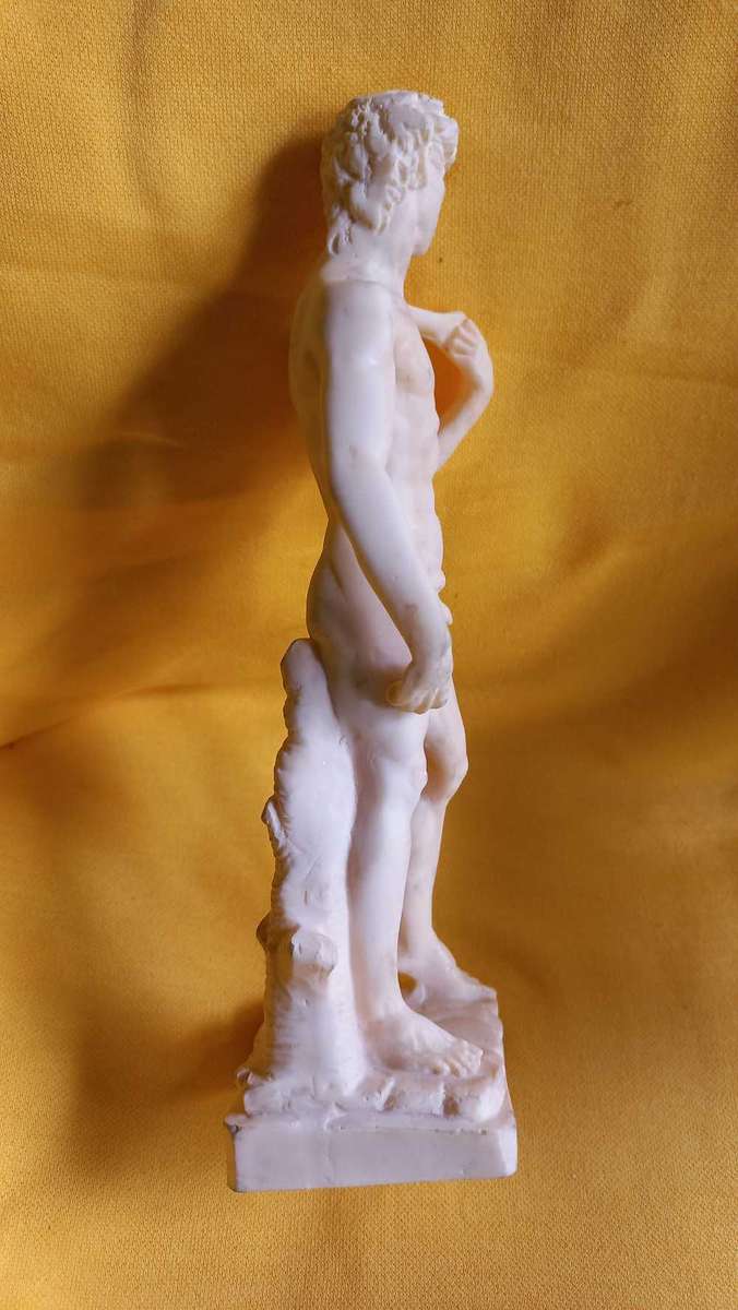 Vintage nude statues of Davide and Aphrodite Venus