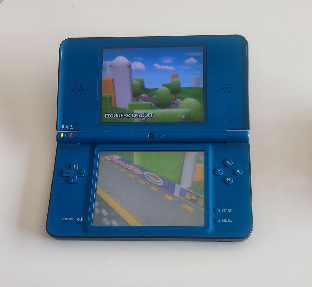 Nintendo Dsi XL console with charger