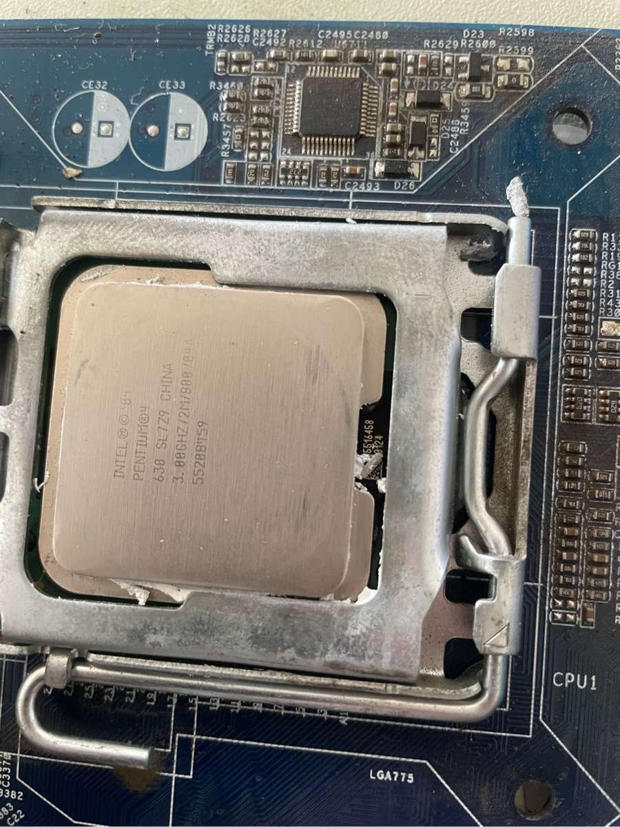 ASRock 775 Motherboard Combo**Been badly repaired**Sold as is