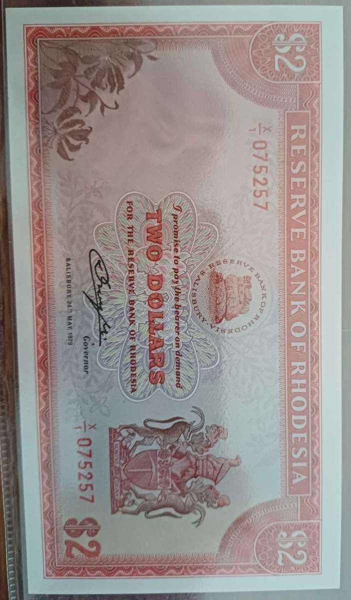 Grsded Unc 67 Two Rhodesia Replacement Dollar by Sangs high grade