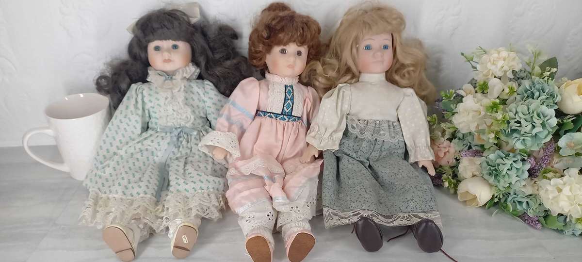 Trio of Porcelain Dolls