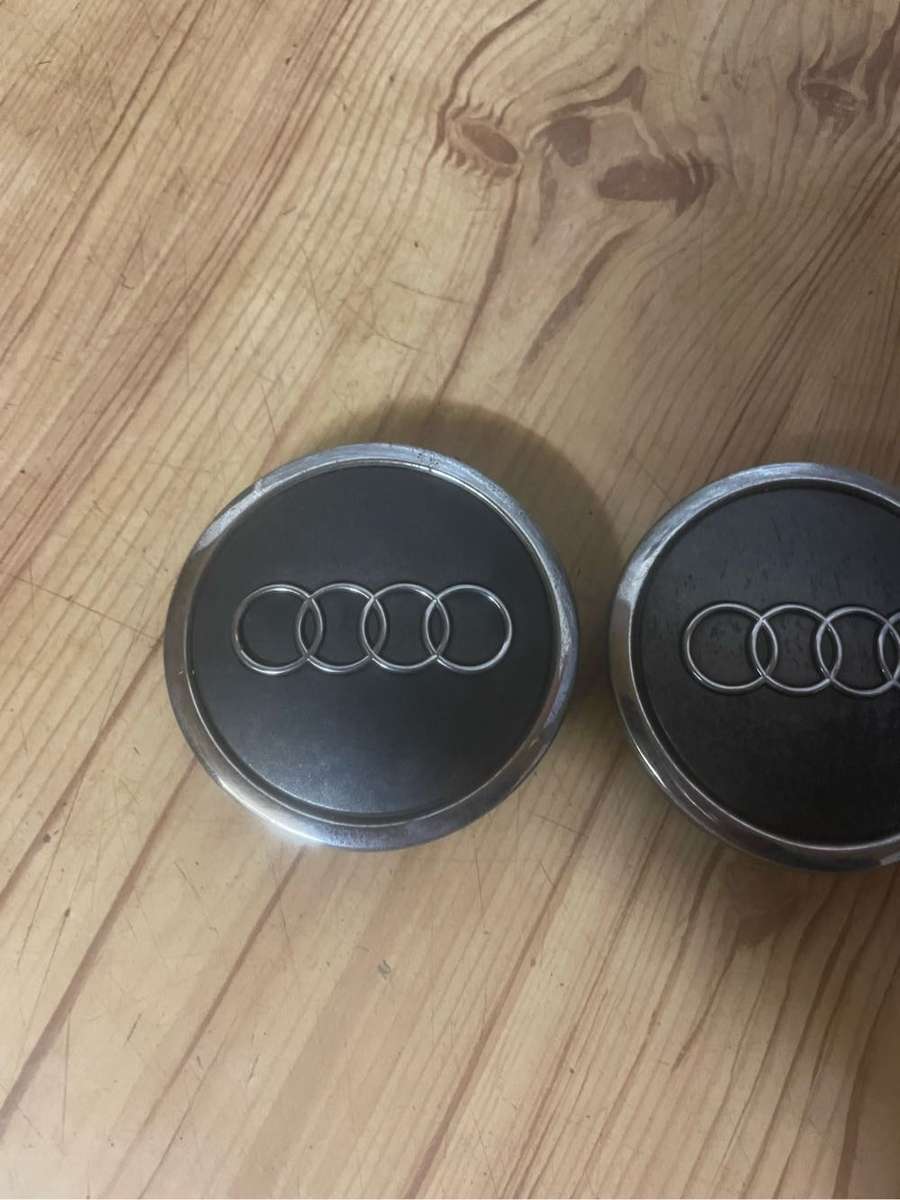 Audi 63mm Grey Mag Center Caps set of 4** Good Condition**