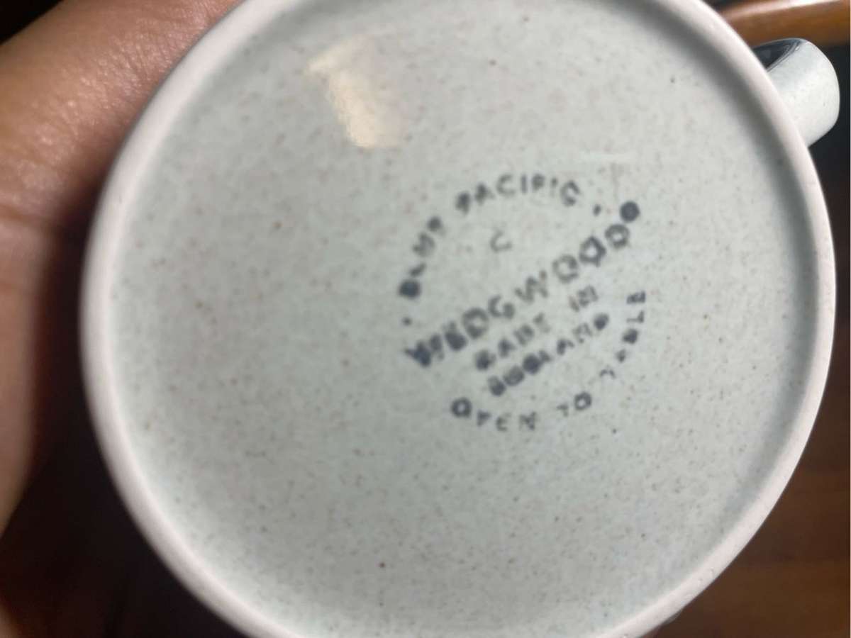 A set of four cups with saucers  - Wedgwood pacific blue pattern