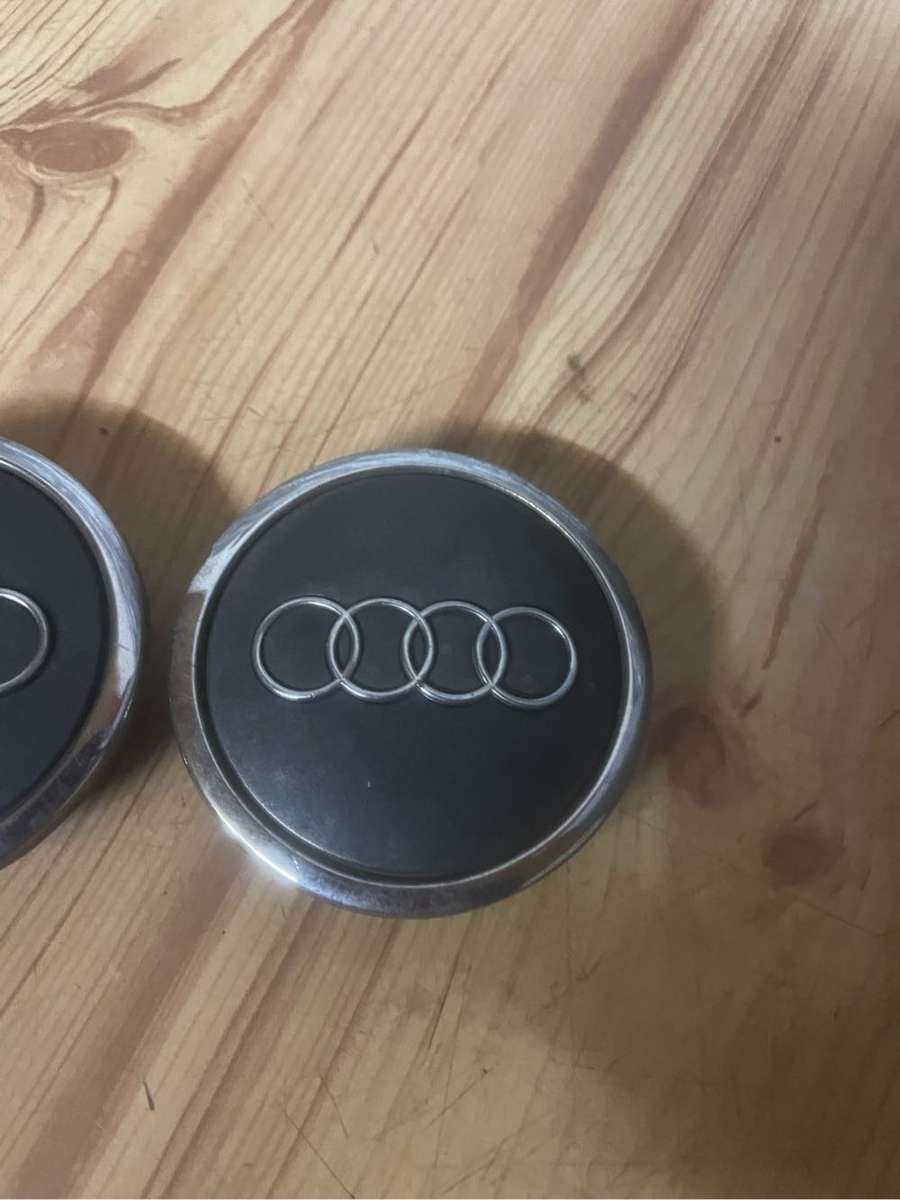 Audi 63mm Grey Mag Center Caps set of 4** Good Condition**