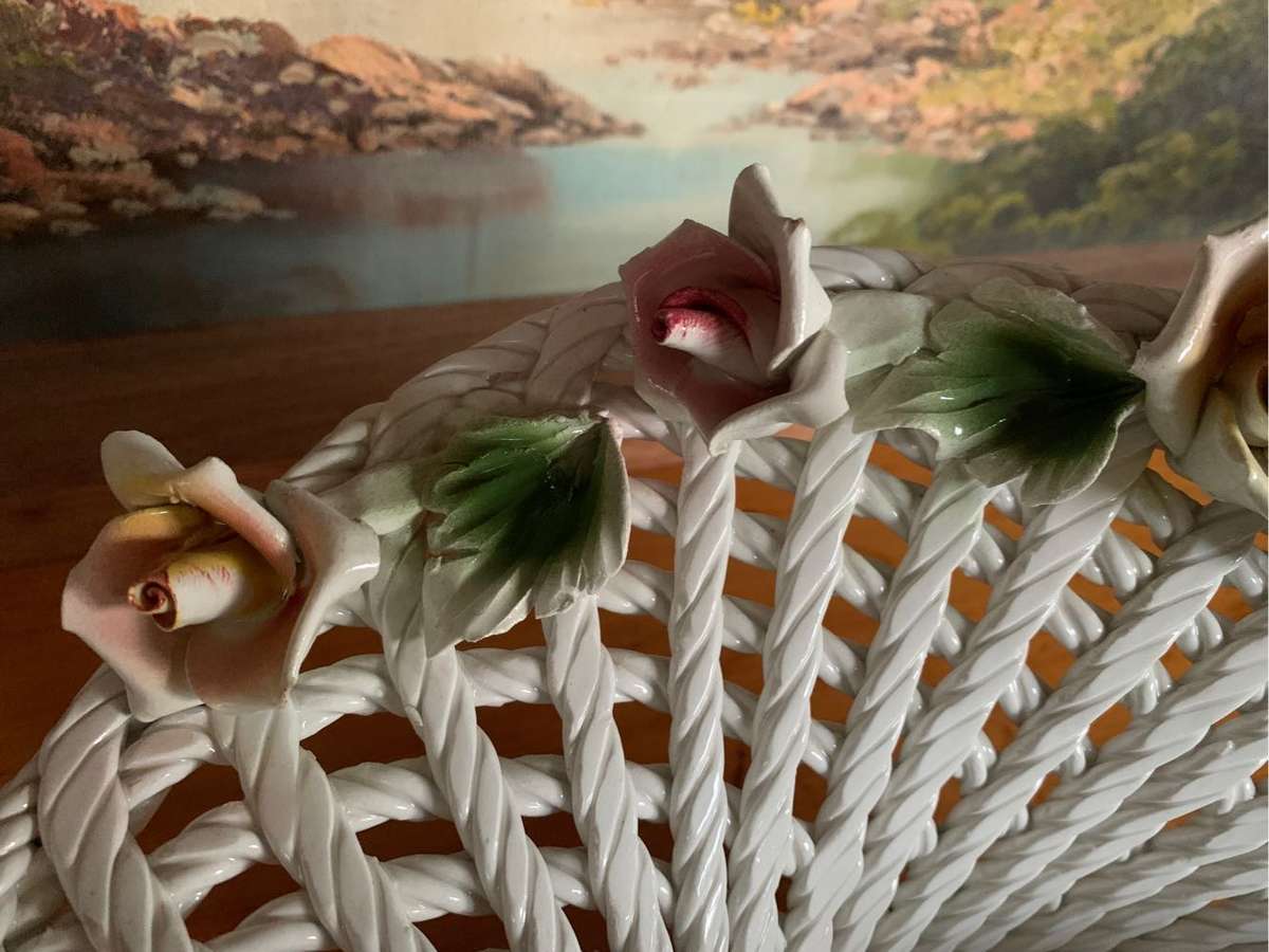 Huge woven pottery basket decorated with roses