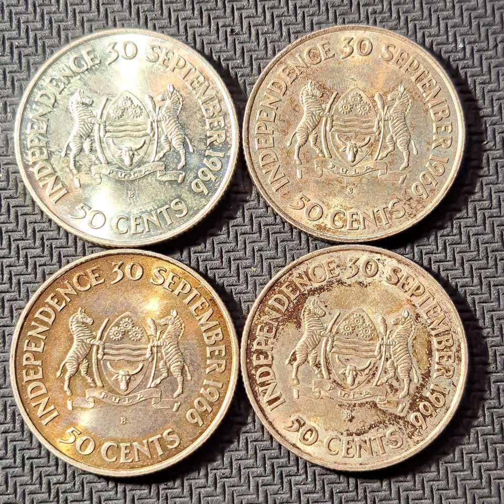 4 x silver coins. Botswana 50 cents, Independence 1966