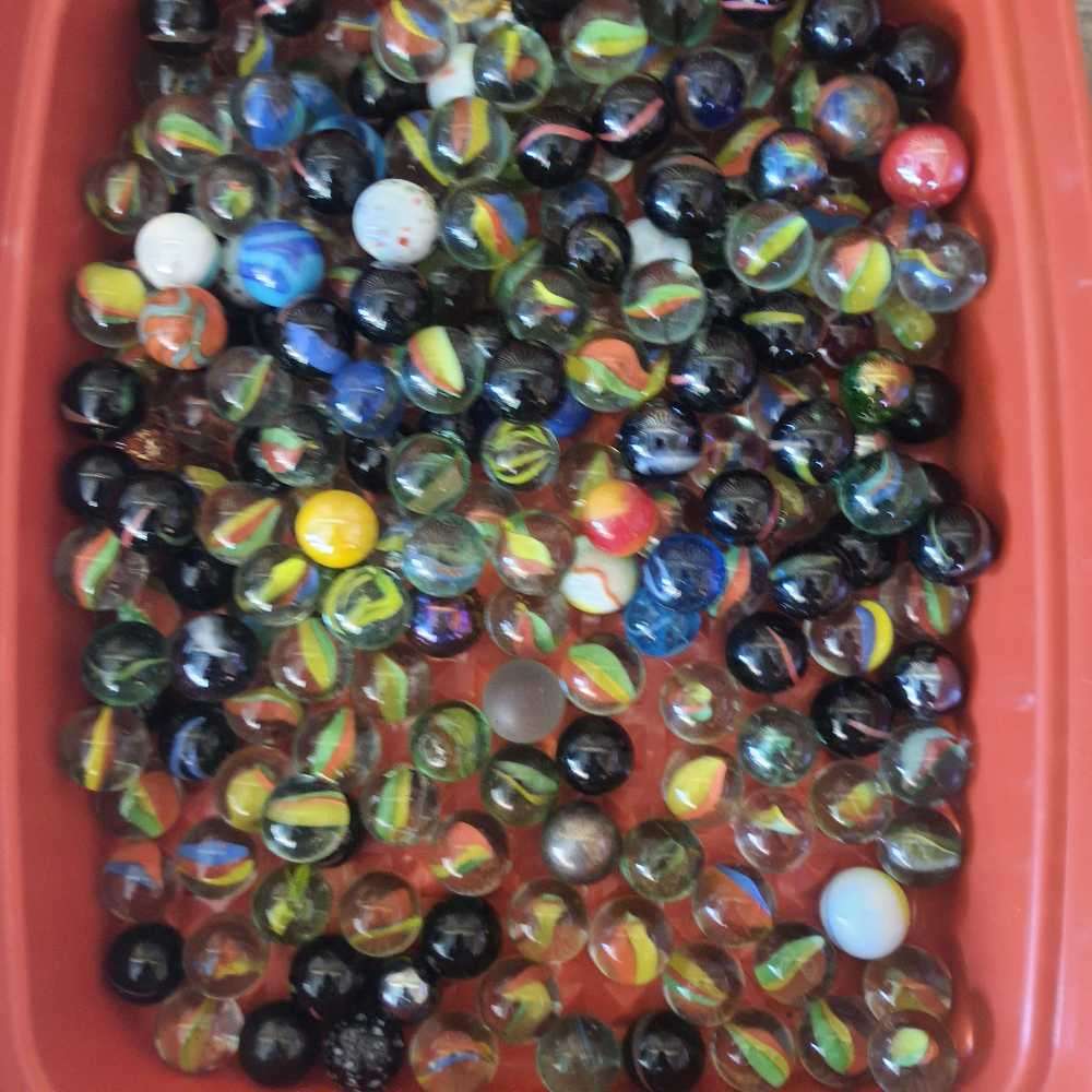 Marbes x 200 small ones and 16 goones big ones