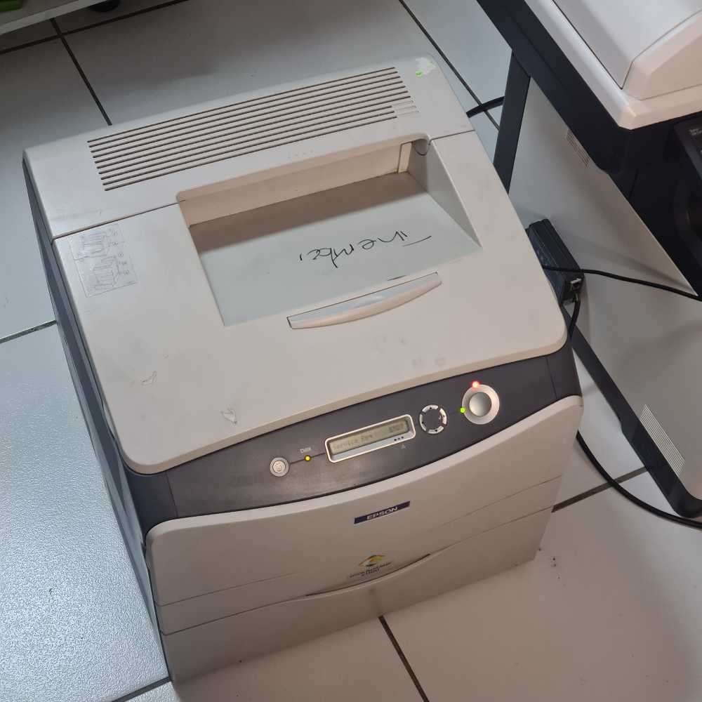 Epson Aculaser c1100 Lazer printer. (turns on, needs attention)