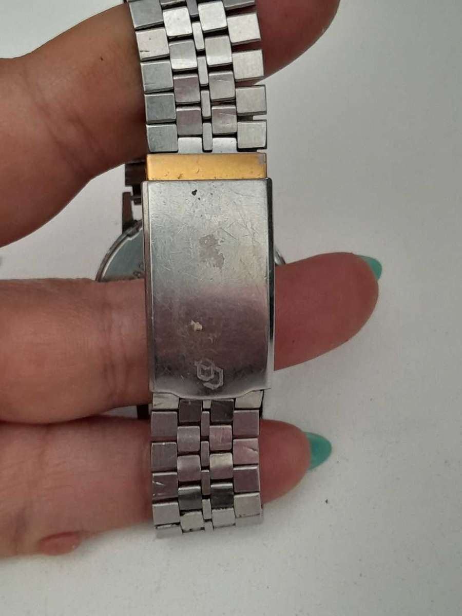 Rotary wind up watch